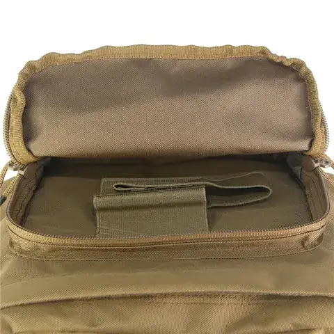 a top zipper pocket of a Coyote brown backpack